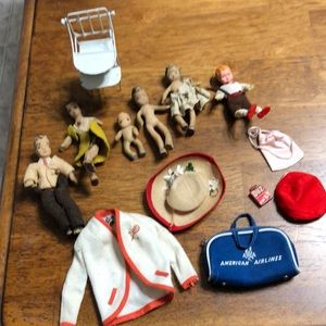 Vintage doll figurines and accessories.